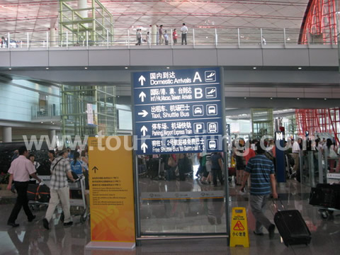 The signboard pointing to the way to Beijing Airport Express Train